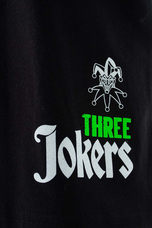 Card slide image -  POLERA  DE EL JOKER NEGRA ESTAMPADA EN ESPALDA PARA HOMBRE
