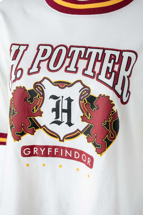 Card slide image -  POLERA  DE HARRY POTTER MARFIL Y VINOTINTO ESTAMPADA EN FRENTE PARA MUJER