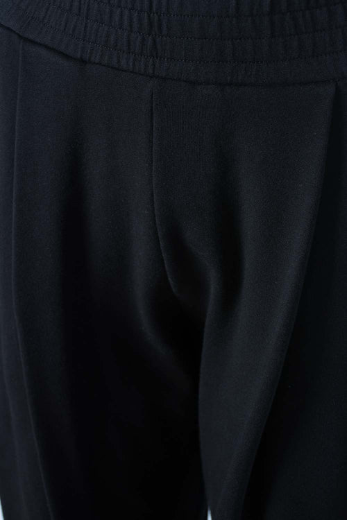 Card slide image -  JOGGER DE MOVIES NEGRO PARA MUJER