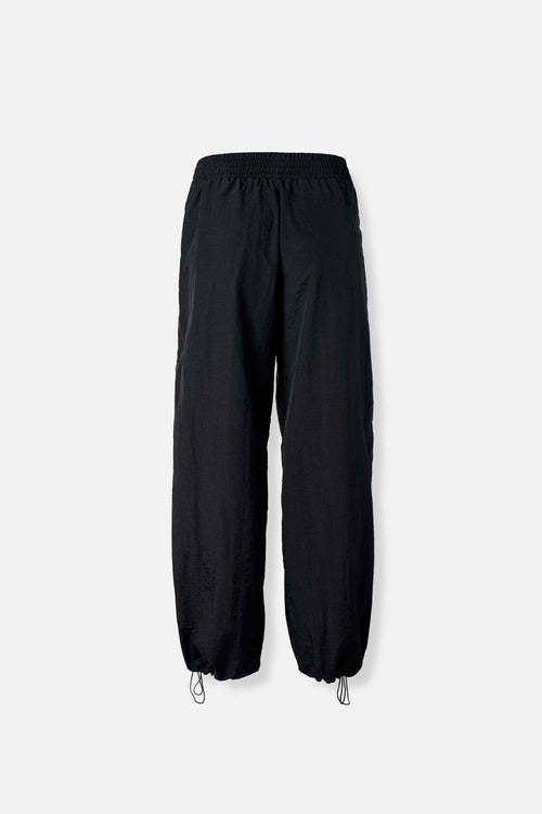 Card slide image -  JOGGER DE MOVIES CON BOTA AJUSTABLE PARA MUJER